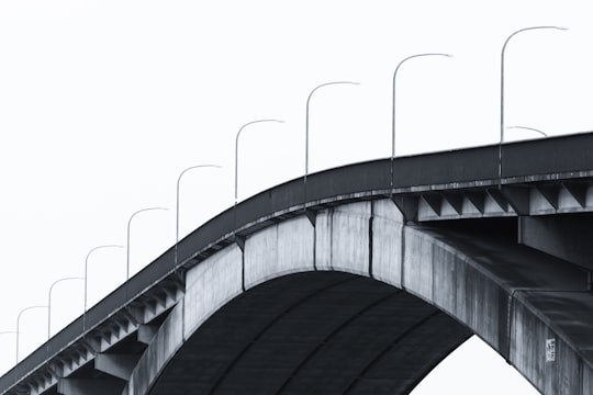 gray concrete bridge under white sky during daytime in Gladesville NSW Australia