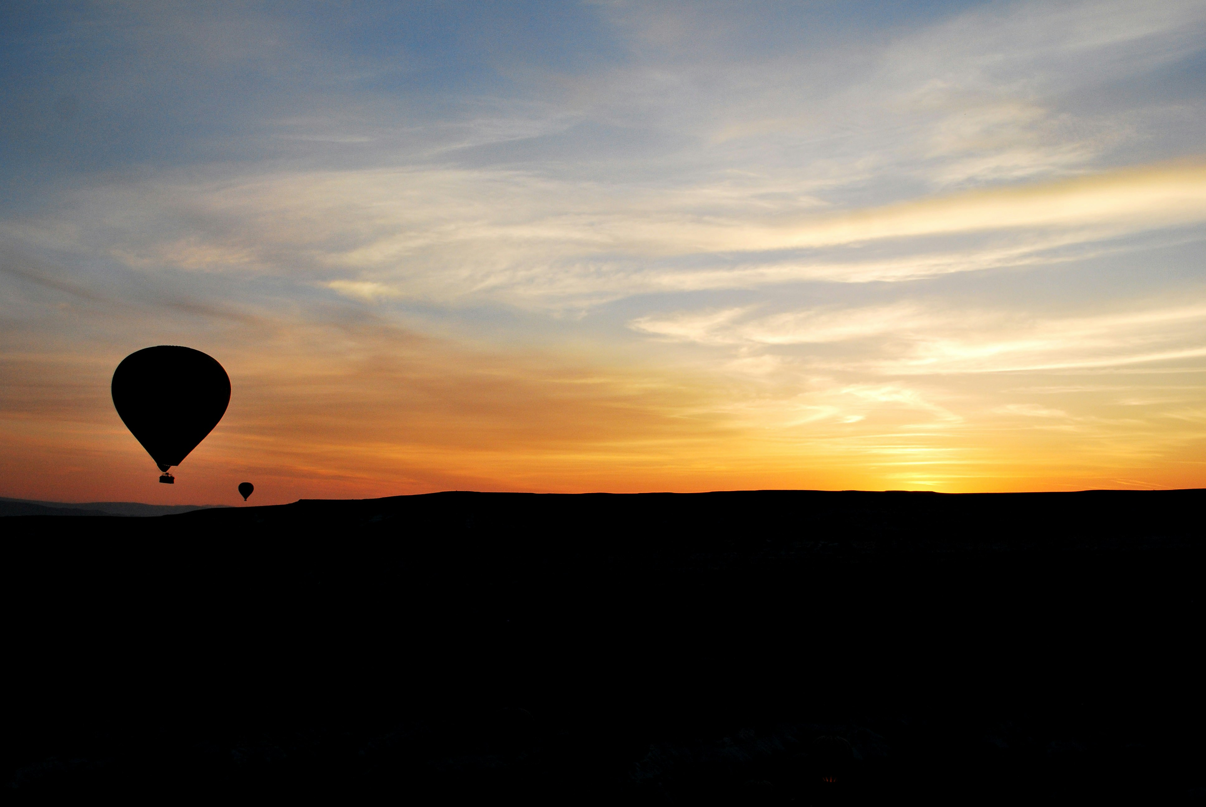 silhouette of mountain during sunset