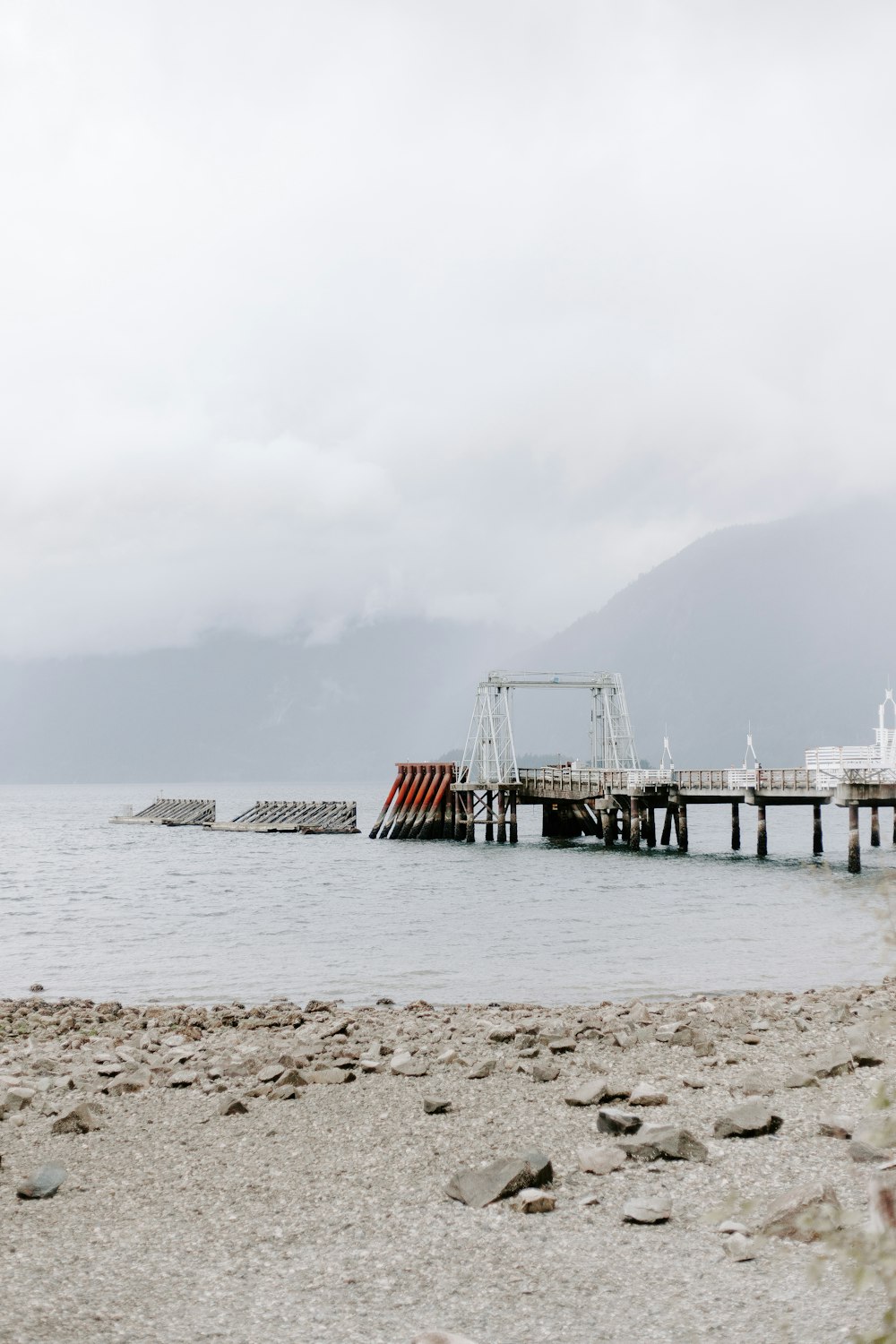 brown wooden dock on sea during daytime