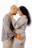 A couple stands closely, facing each other, with their foreheads touching. The man gently holds the woman's waist, while the woman rests her hands on his shoulders. Both are smiling warmly and wearing casual clothing.