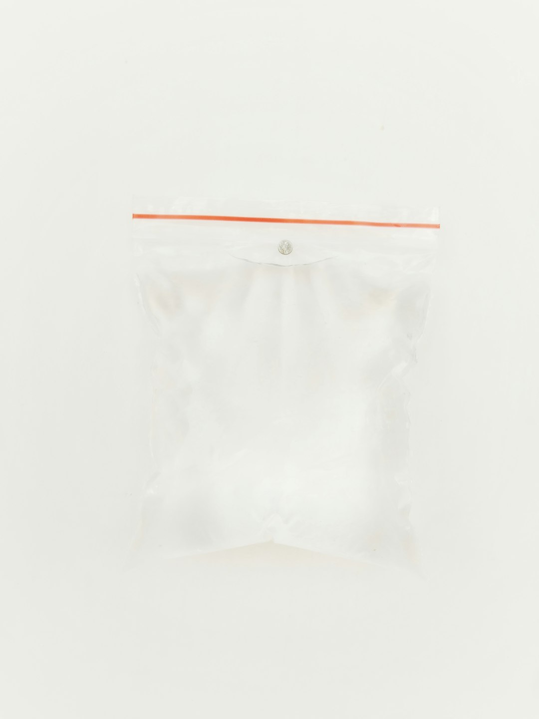 white plastic pack on white surface