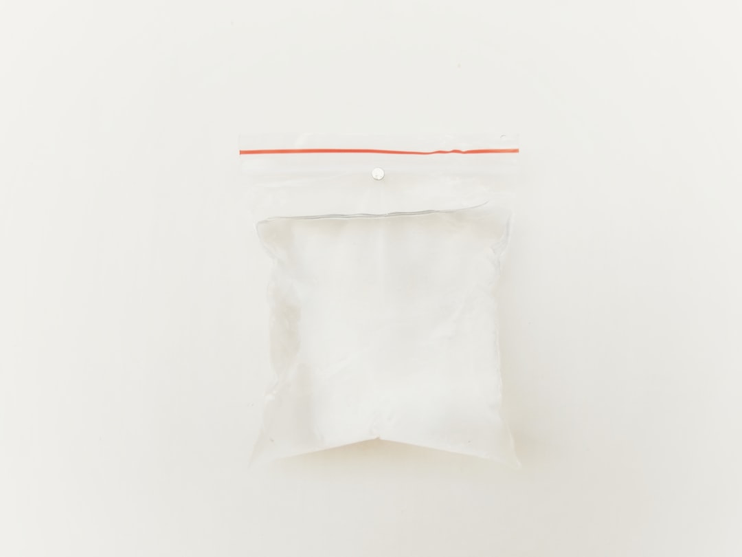 white plastic pack on white surface