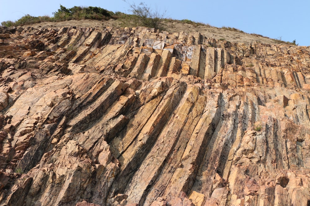 brown rock formation under blue sky during daytime