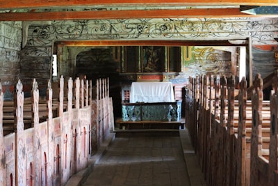 The church floor restored to a sparkling finish, highlighting the natural wood grain.