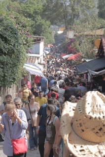 A vibrant local market bustling with colorful stalls and visitors