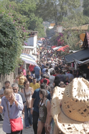 A private group exploring vibrant local markets with their friendly guide.