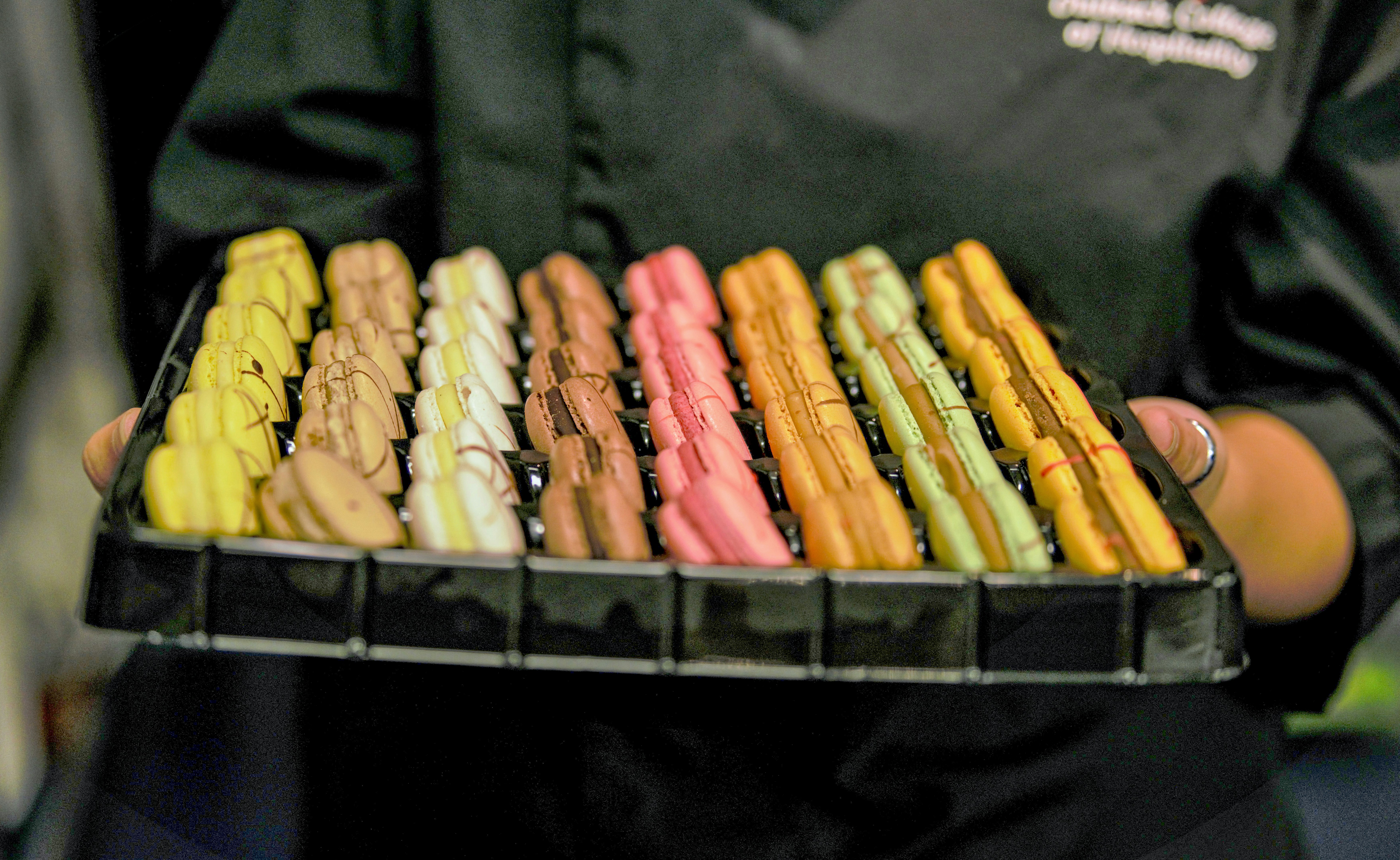 Tray of colourful glazed churros