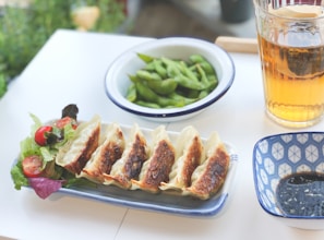 sliced meat on white ceramic plate