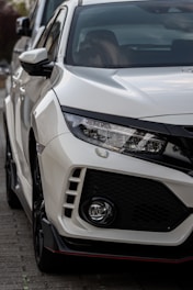 A sleek, affordable car parked ready for prompt rental delivery.