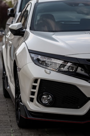 A sleek, affordable car parked ready for prompt rental delivery.