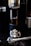 A satisfied customer enjoying a cup of coffee delivered by Hover Java's automated service.