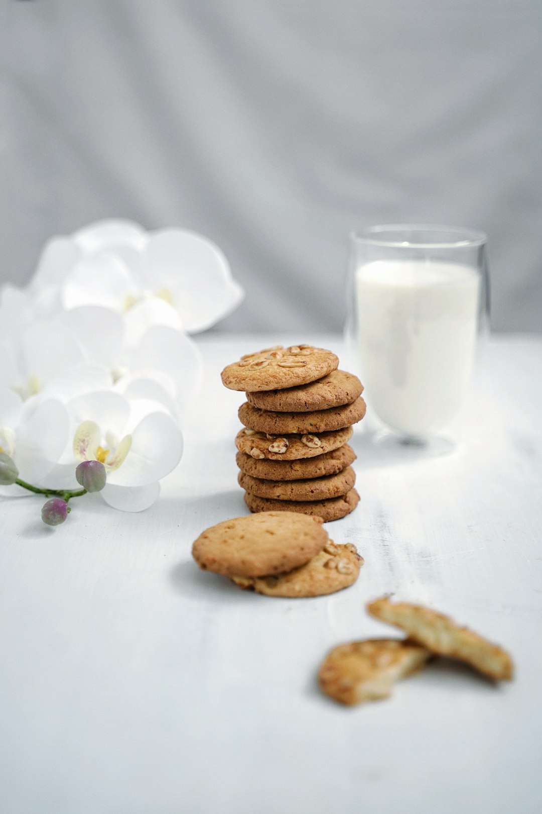 cookies and milk in drinking glass