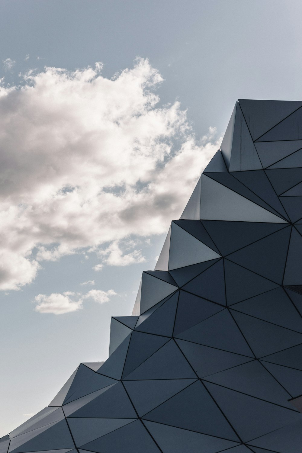 gray concrete building under blue sky during daytime