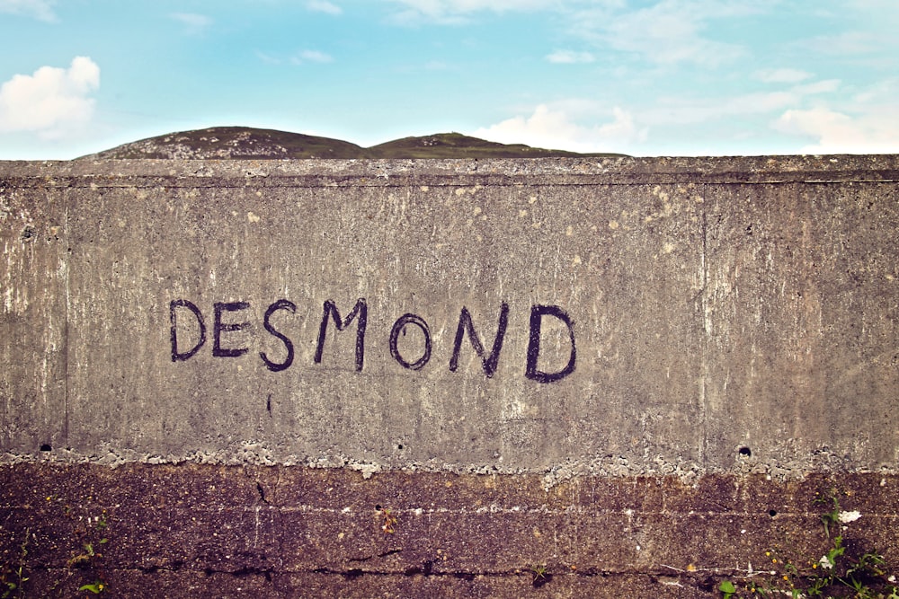 text on brown concrete wall