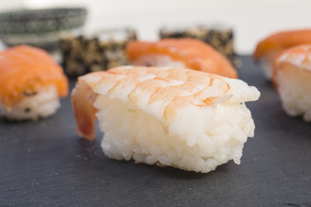 white rice on black and white ceramic plate