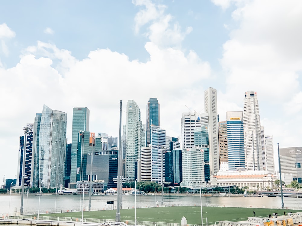 city skyline under white cloudy sky during daytime