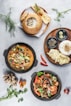 cooked food on black round plate