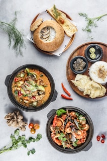 cooked food on black round plate