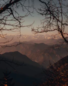 A panoramic view of Saint Catherine’s mountain range bathed in warm afternoon light.
