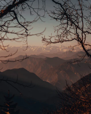 A panoramic view of Saint Catherine’s mountain range bathed in warm afternoon light.