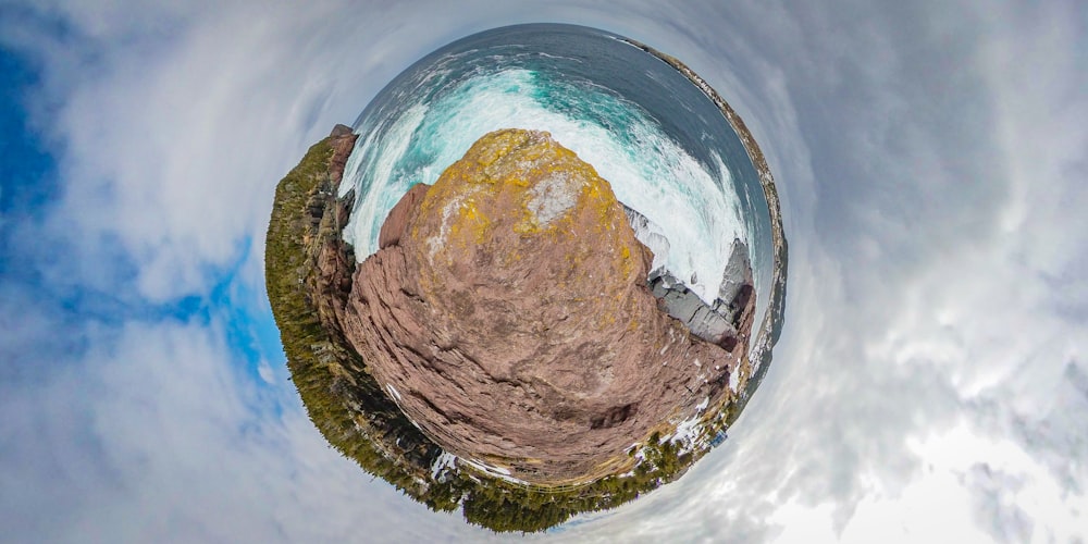 brown rock formation in water