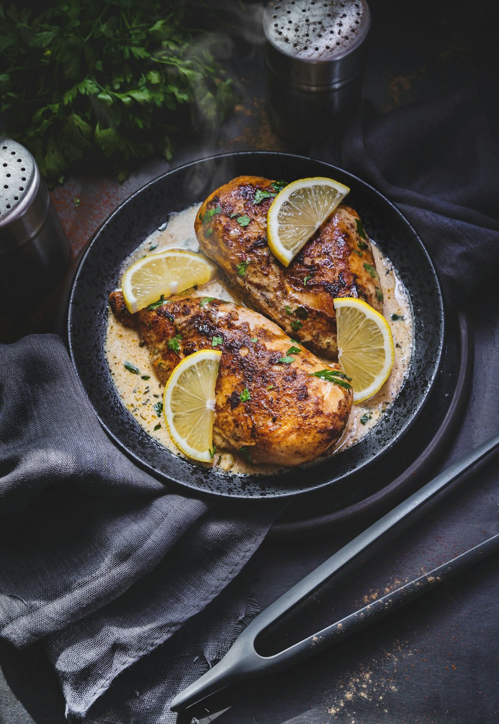 cooked food on black ceramic plate