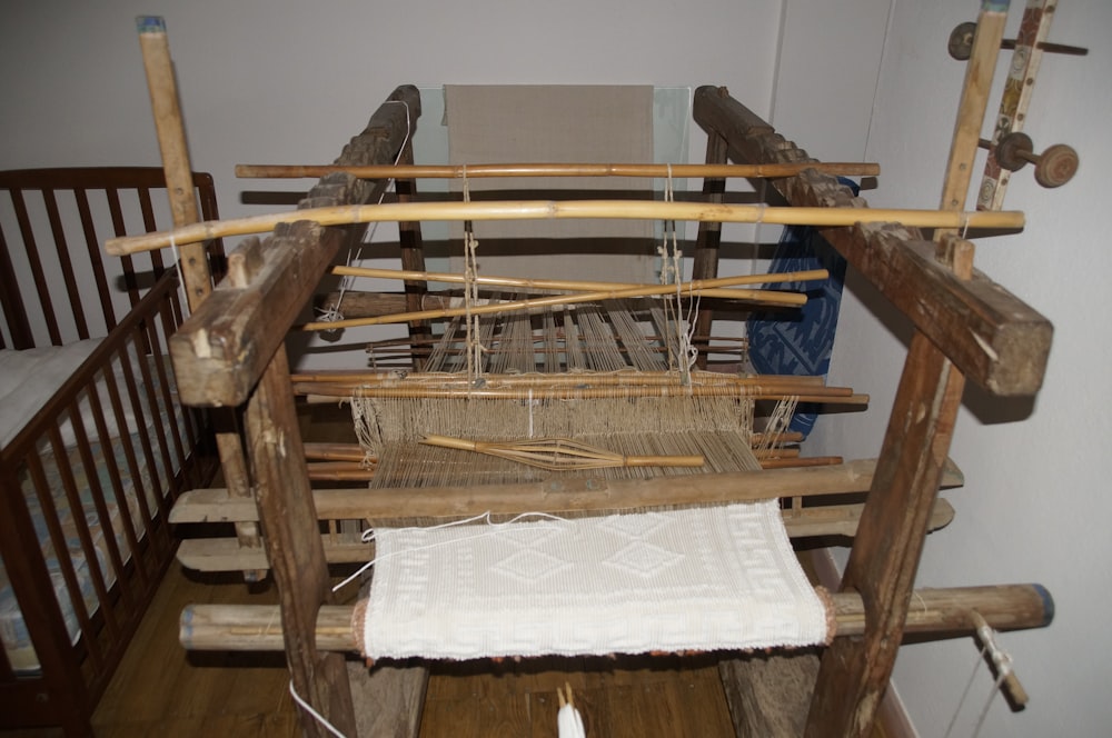 white textile on brown wooden chair