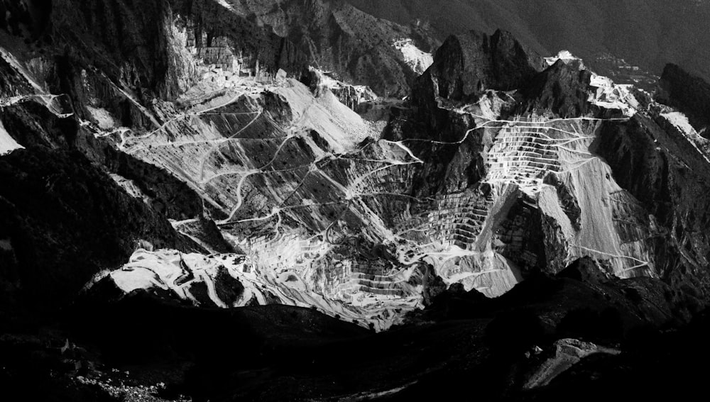 grayscale photo of ice in mountain