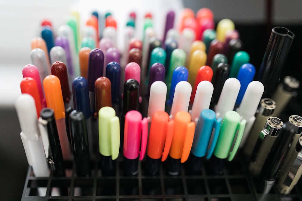 multi colored pen on rack