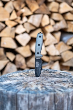 black and silver knife on brown and gray rocks