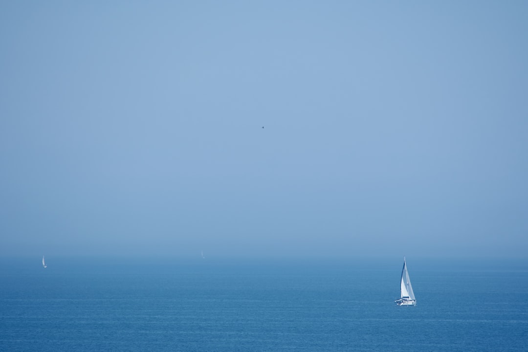 sailboat on sea during daytime