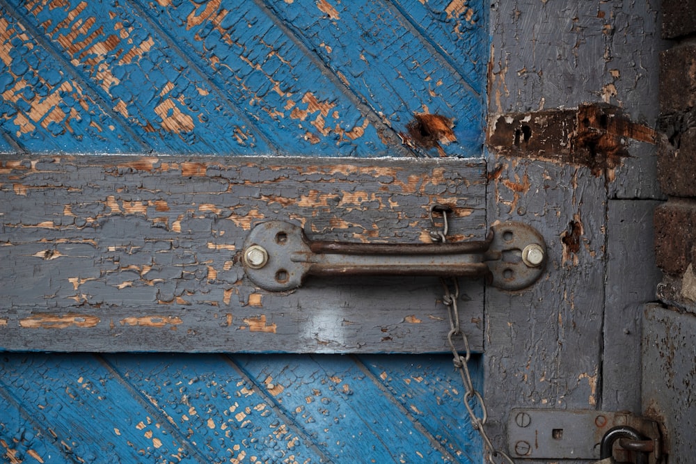 brown wooden door with brass door knob