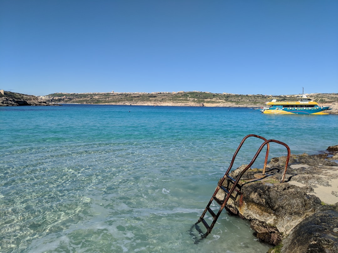 Beach photo spot Comino L-Imġarr