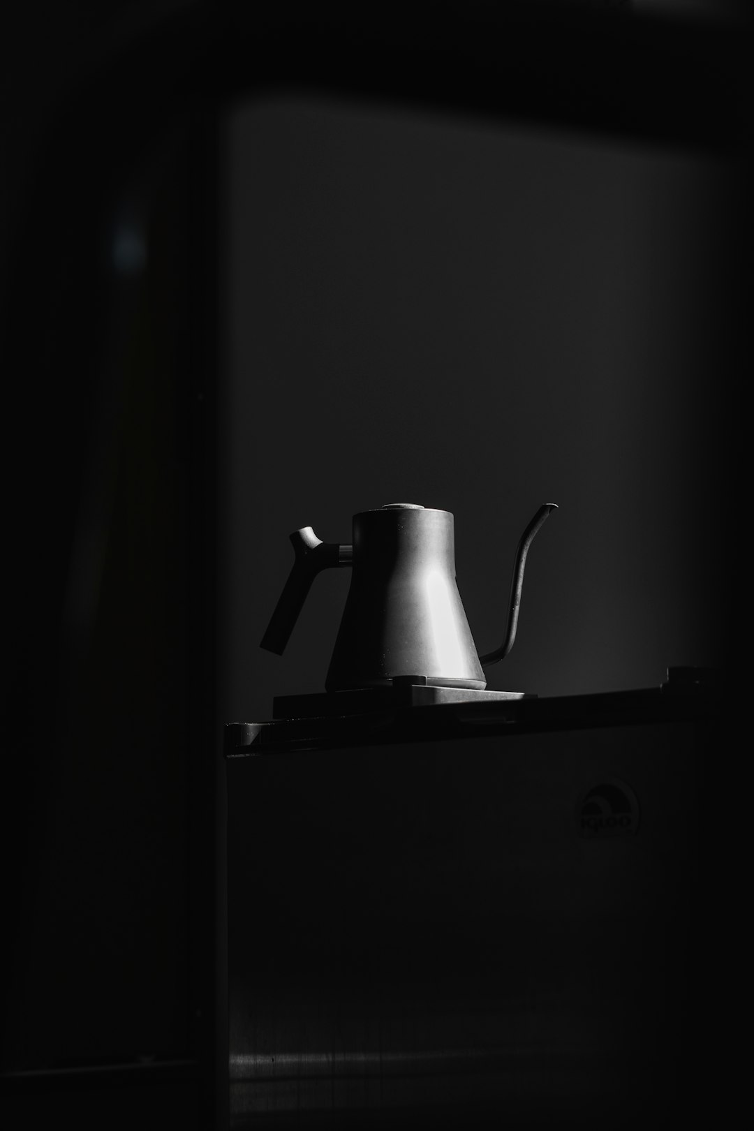 black and silver kettle on white table