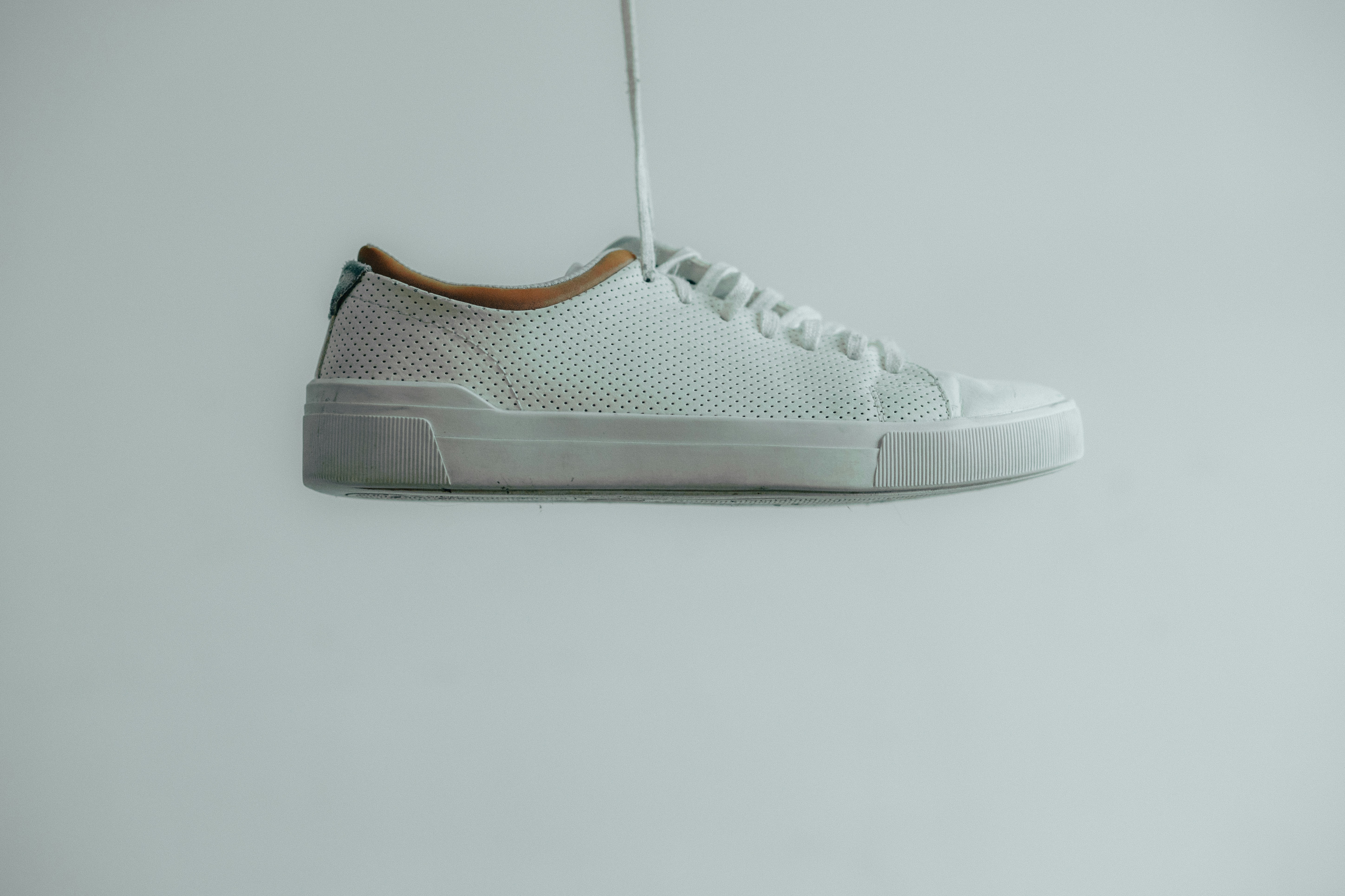 Gray and white Nike running shoes