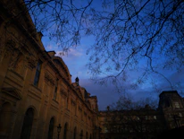 An elegant exterior 3D visualization of a contemporary building at dusk, highlighting intricate architectural details.