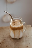 clear glass jar with brown liquid