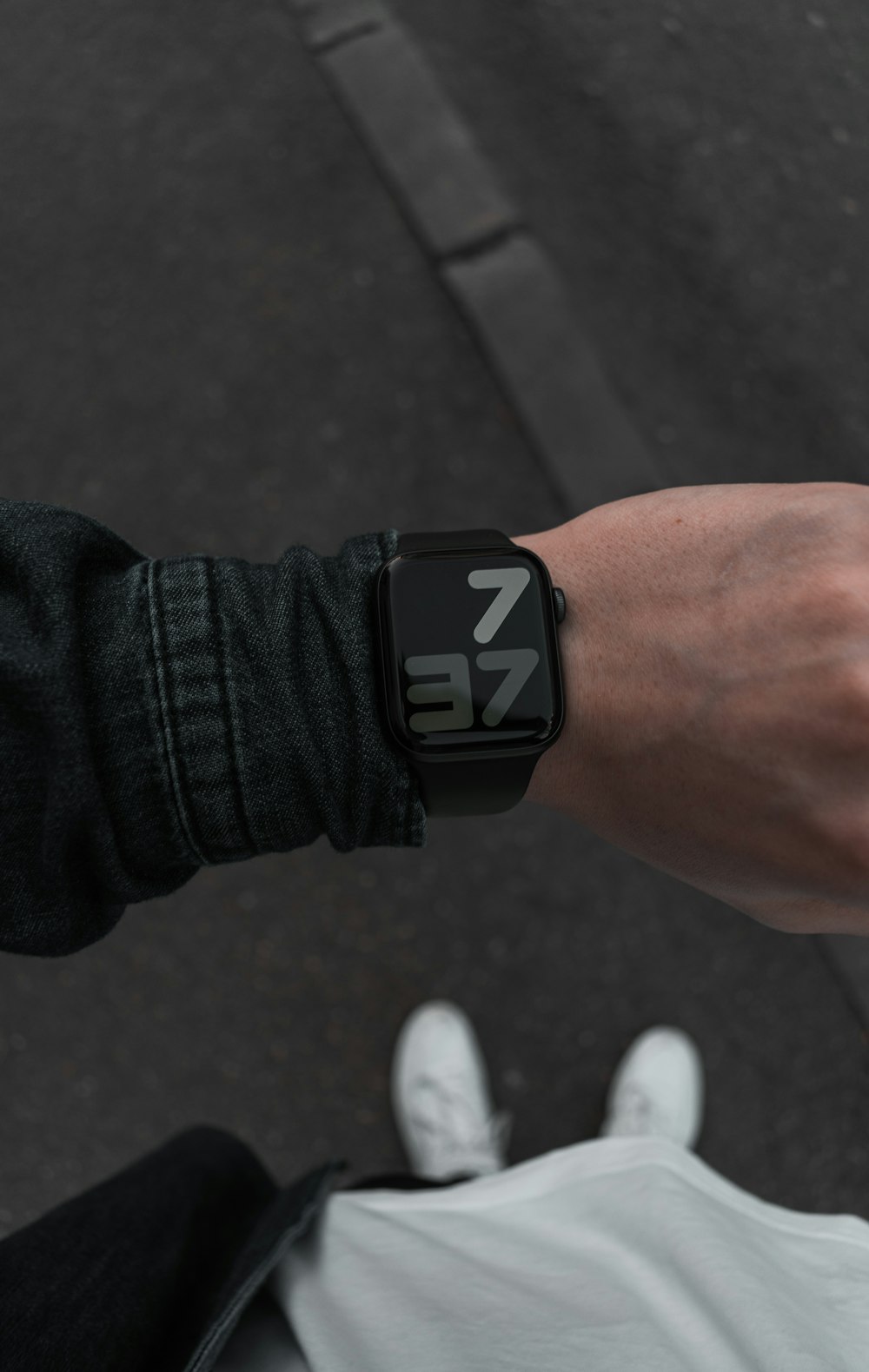 person wearing black smart watch