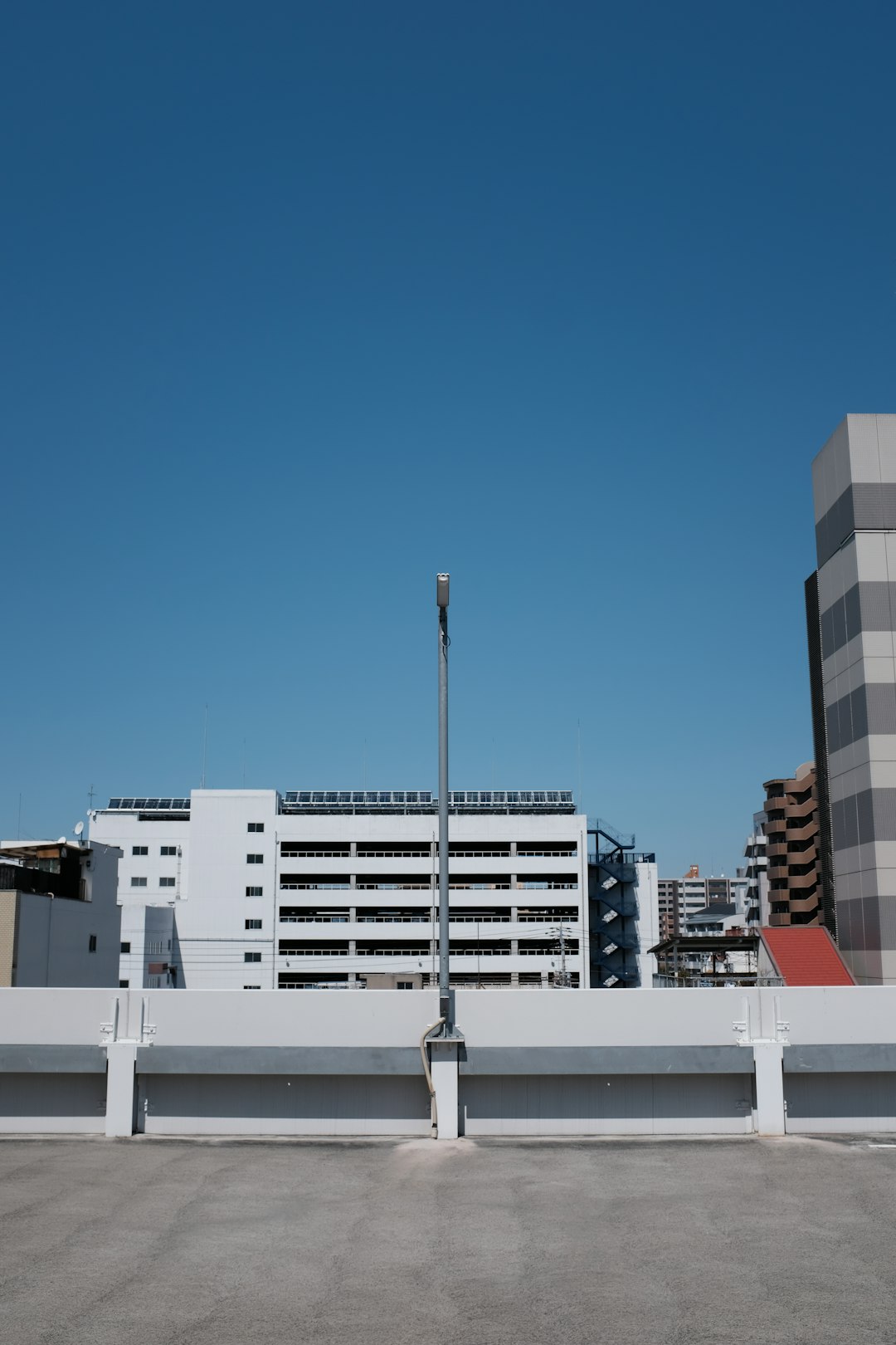 white and brown concrete building under blue sky during daytime