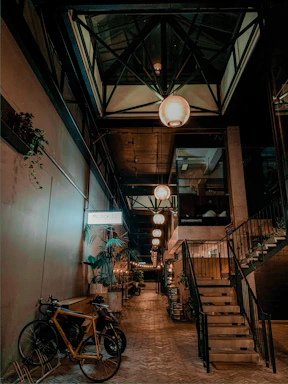 A welcoming studio entrance with bikes lined up and warm lighting.