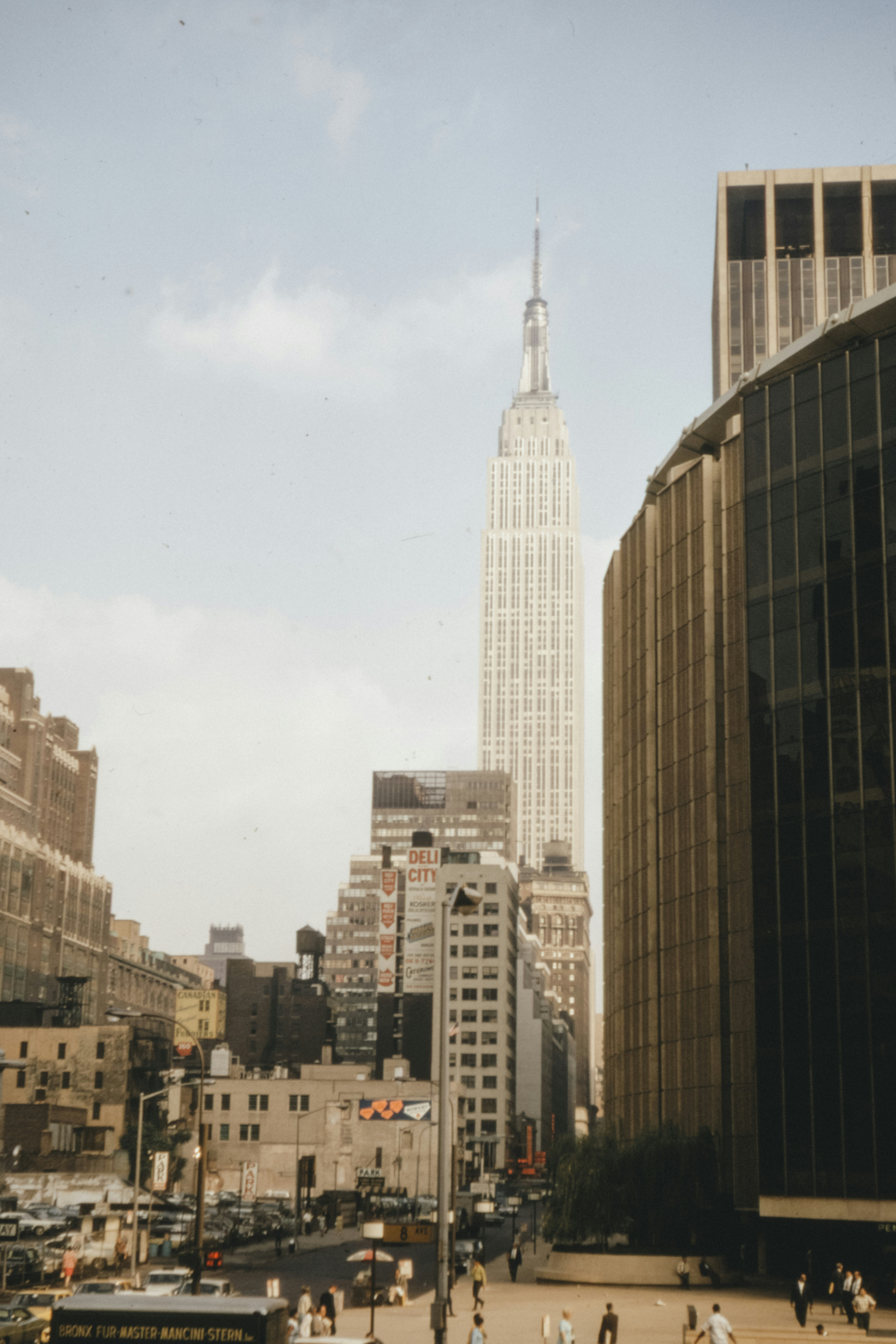 white and brown concrete building under white sky during daytime