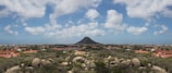 A panoramic view of a foothills home with professionally designed xeriscape landscaping blending with the natural terrain.
