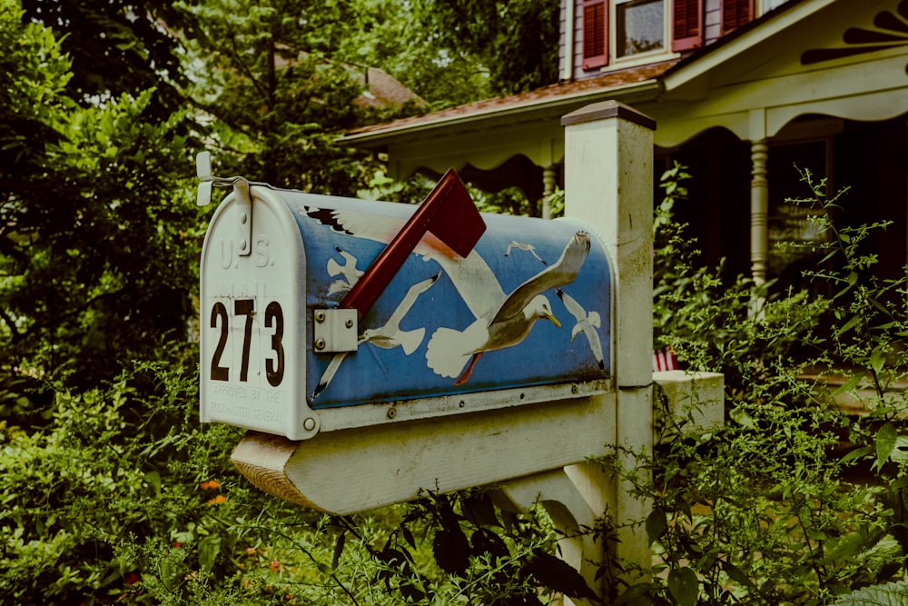 white and red mail box