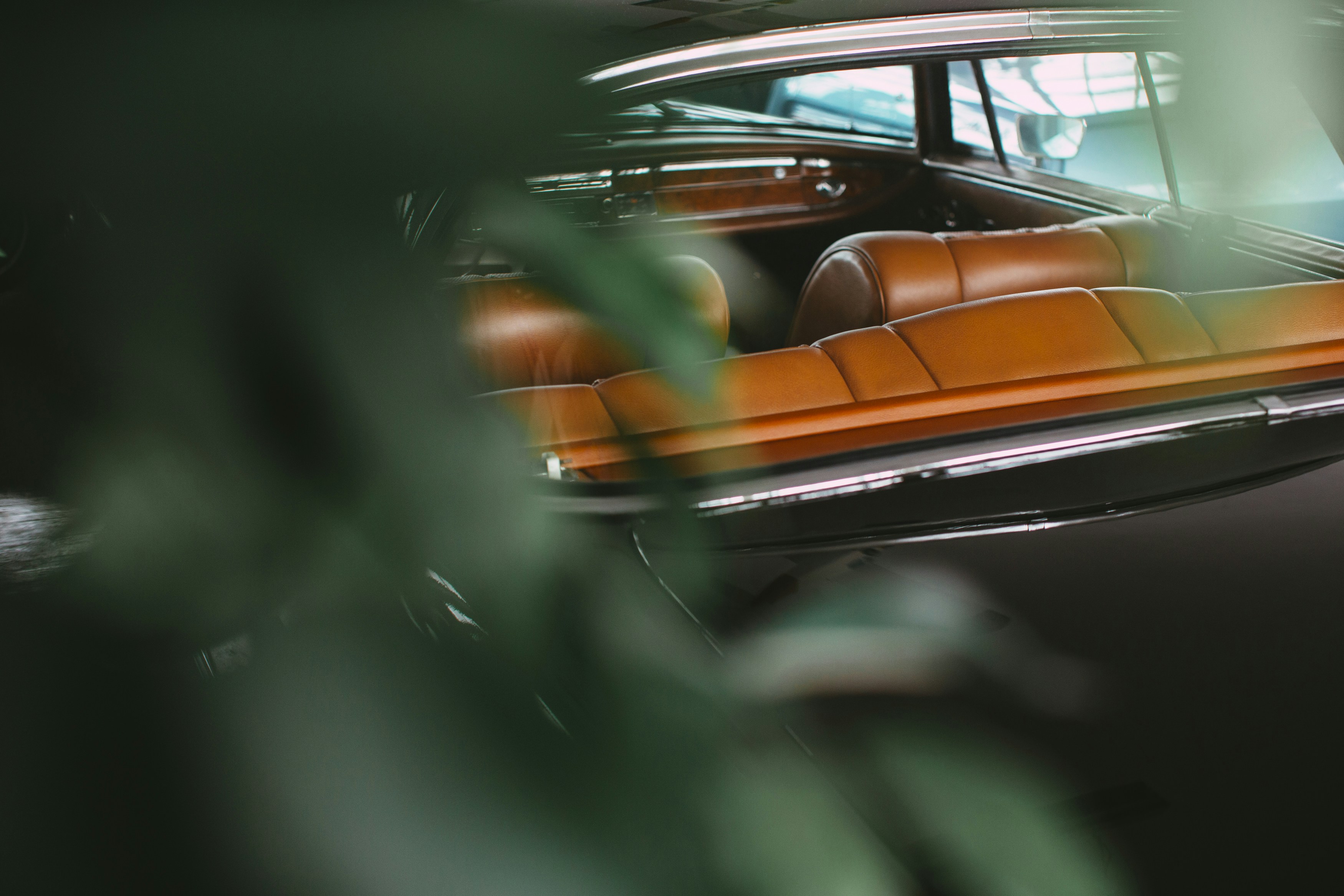 orange and black car in tilt shift lens, Luxury vintage german classic oldtimer: Mercedes-Benz W111 250SE Coupé (Year: 1966)