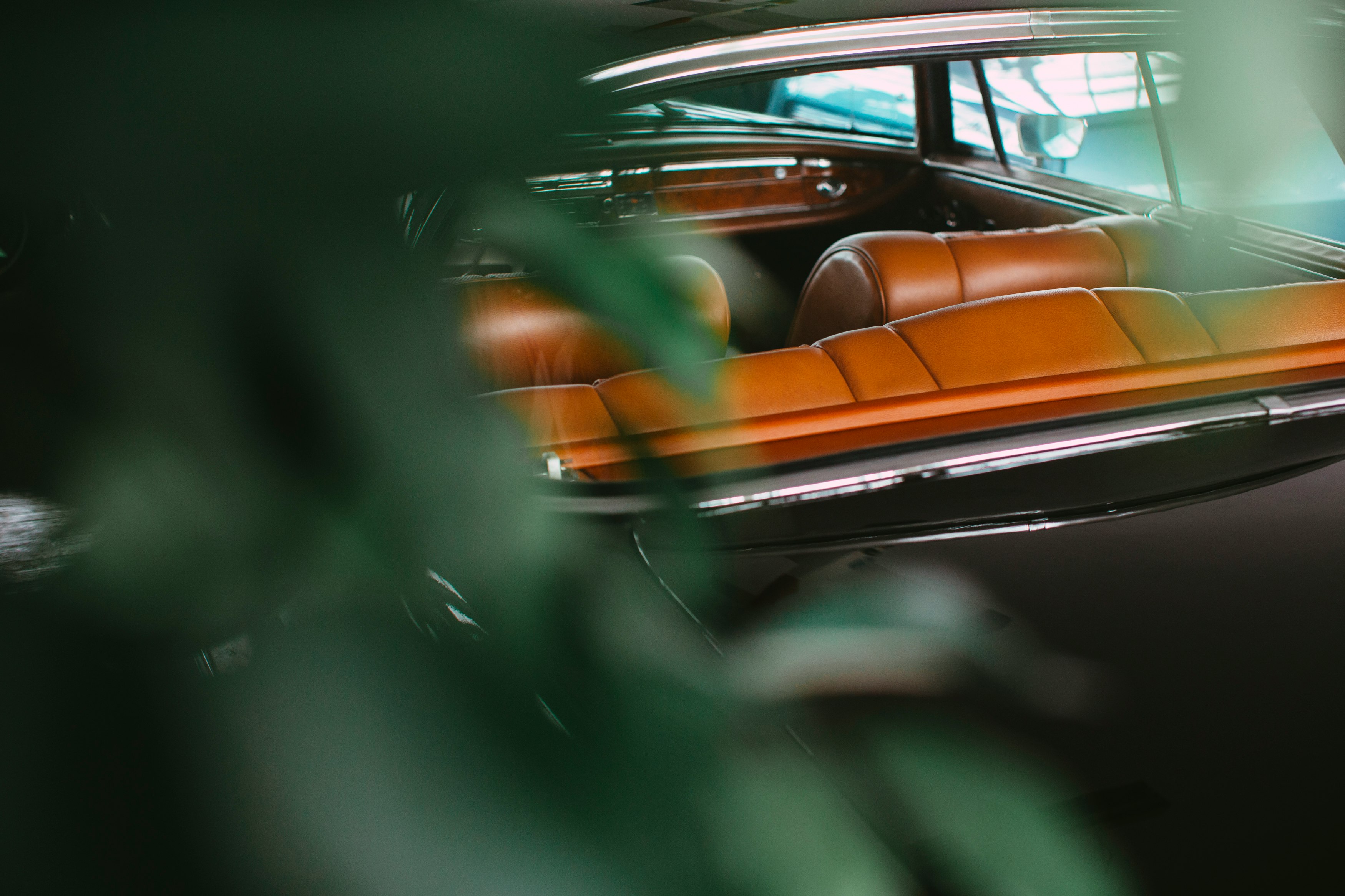 orange and black car in tilt shift lens