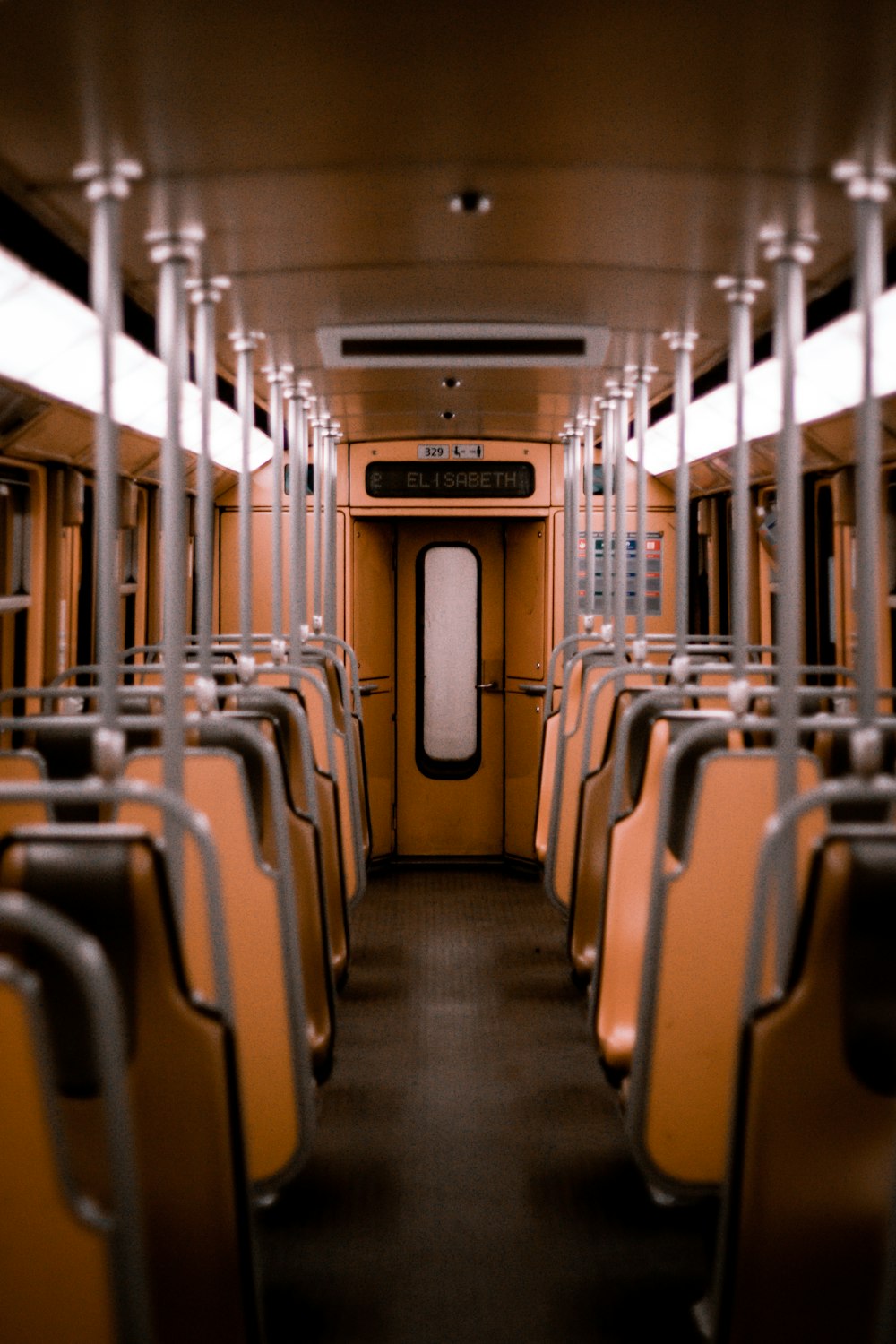 white and brown train interior