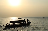 Sunset view over the German Channel with tourists enjoying the serene atmosphere on a boat