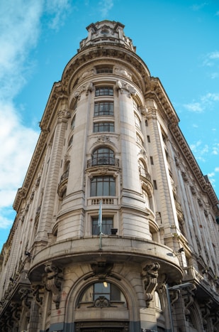 brown concrete building under blue sky during daytime