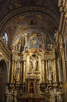 A close-up of the intricately carved wooden altar inside the church.