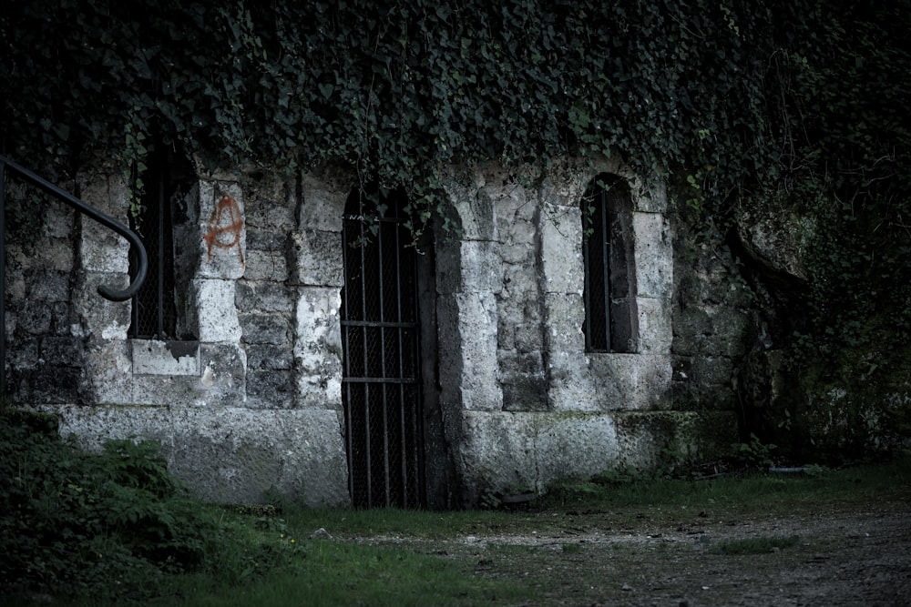 black metal door on gray concrete building